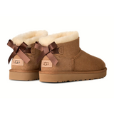 UGG® Classic Ultra Mini Bailey Bow (Women) - Chestnut