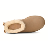 UGG® Classic Ultra Mini Bailey Bow (Women) - Sand